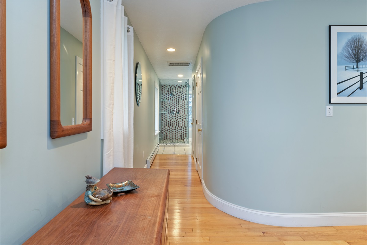 King Master bedroom with lake views and ensuite bathroom with walk in shower