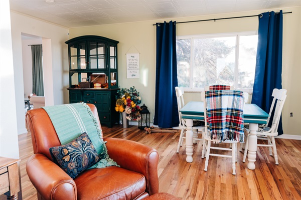 Rest and relaxation is a sure thing in this comfy leather chair right infront of the wood burning stove. Its a perfect spot for that novel you've been wanting to read.