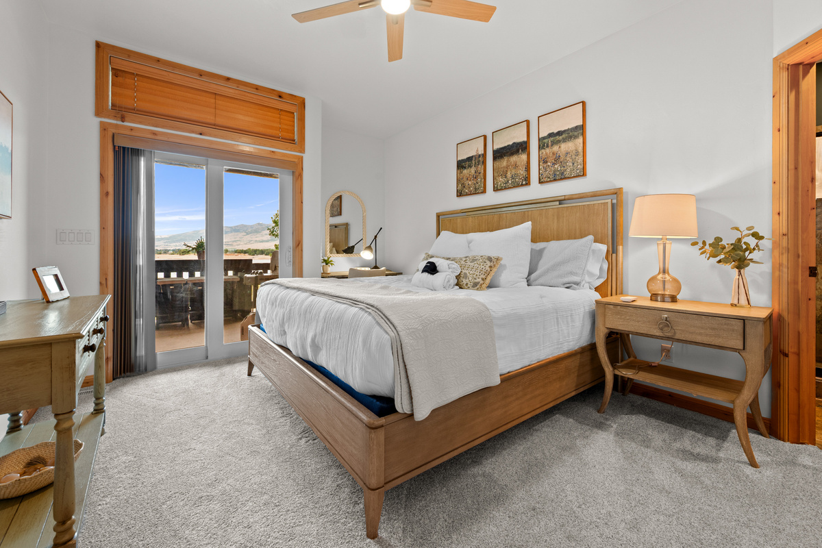 Wake up to natural light and step directly onto the balcony for lake views from the primary bedroom.