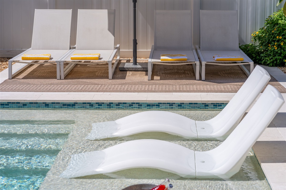 Lounge poolside with a cold drink, fire up the grill, or gather around the outdoor dining table with your crew.