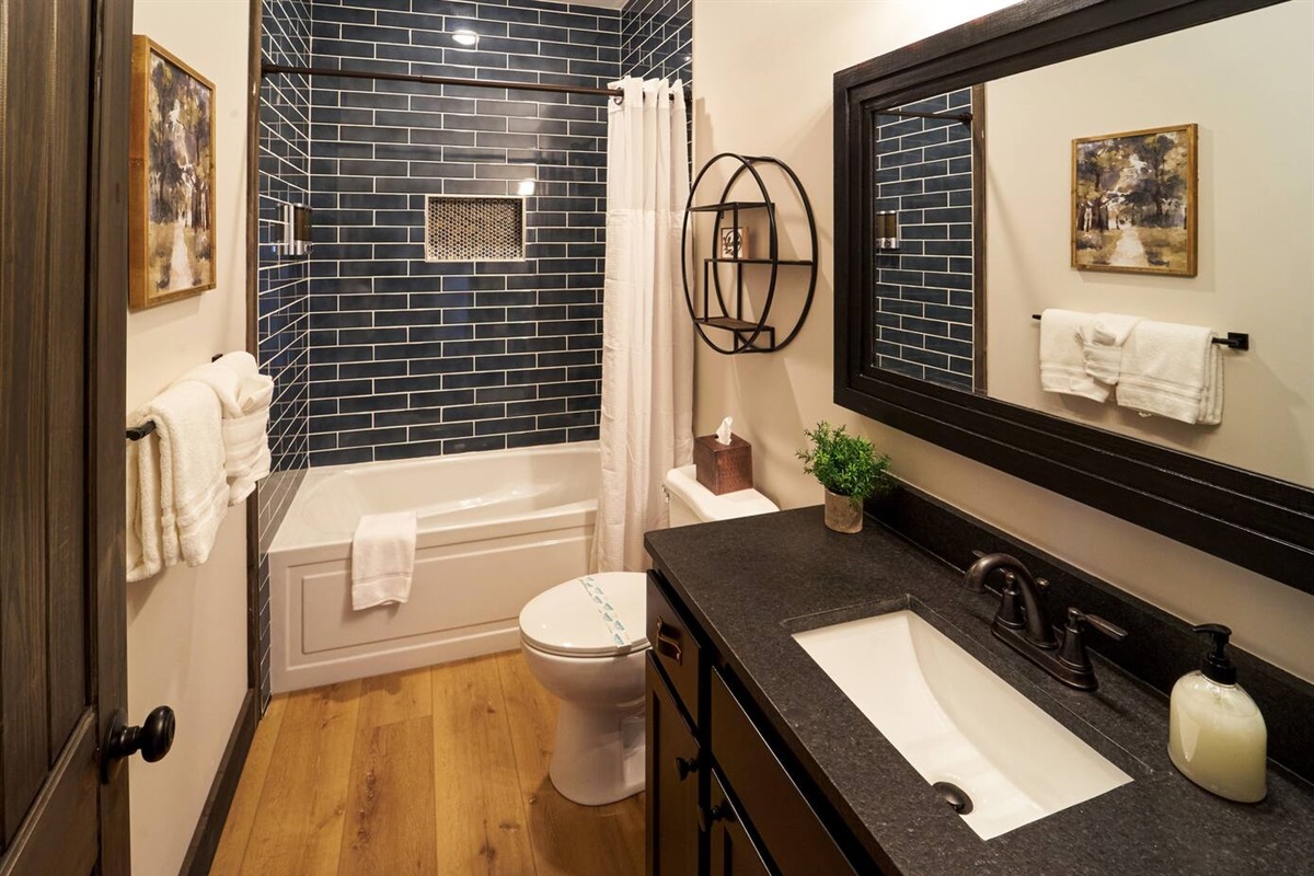 Subway tile and bathtub for bedroom 2