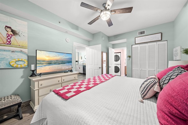 Secondary King bedroom with a 50" Samsung Smart TV connects to newly remodeled guest bathroom
