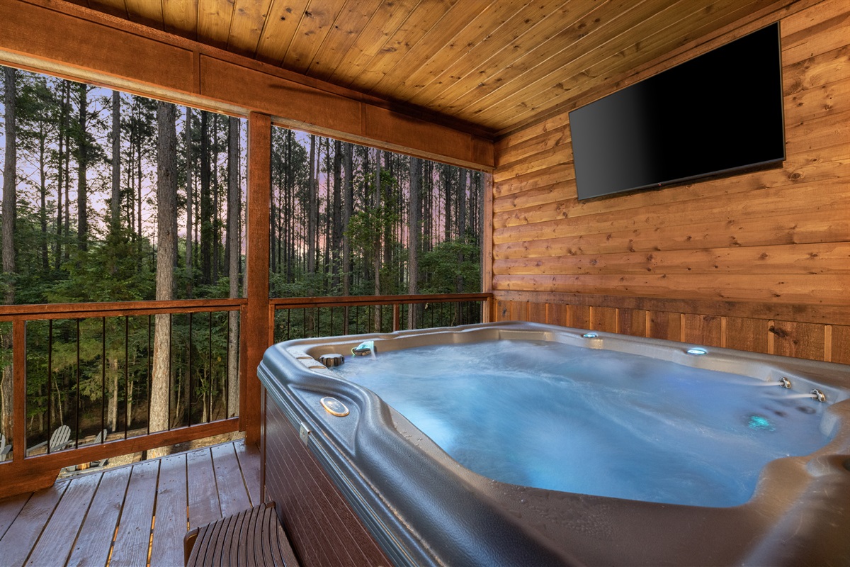 Madison Arbor's hot tub is designed for ultimate relaxation. Whether you prefer to immerse yourself in nature or catch up on your favorite streaming shows, you'll find peace and tranquility on the deck.  On chilly nights, the door is just a few steps away!