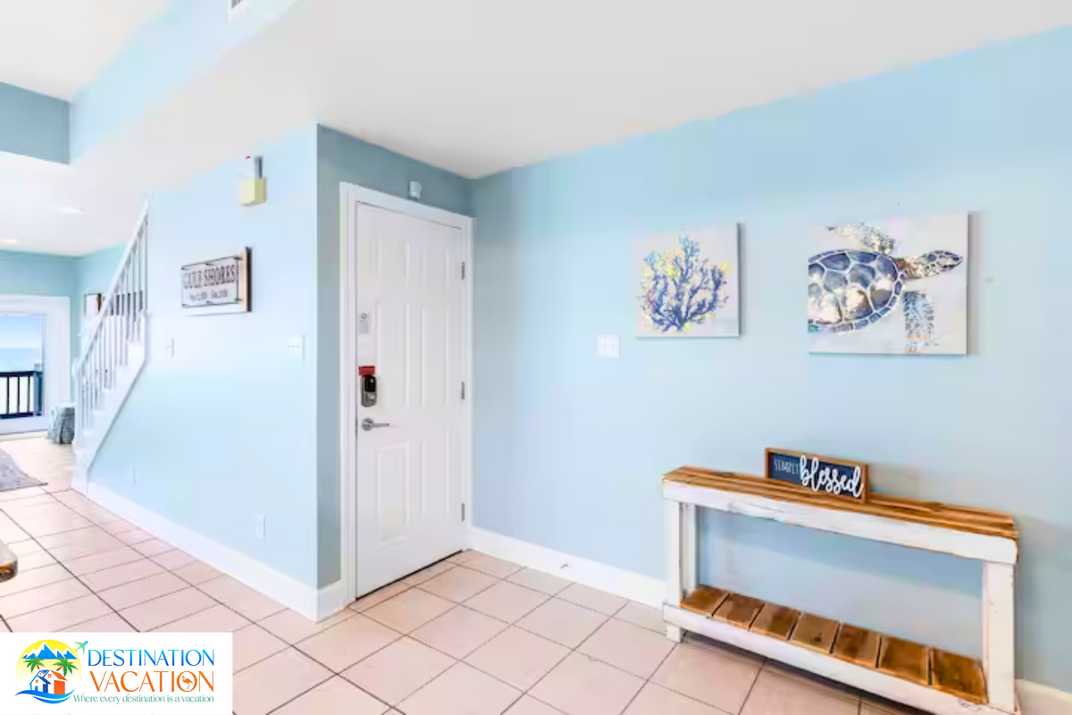 Bright coastal hallway connecting every comfortable space.