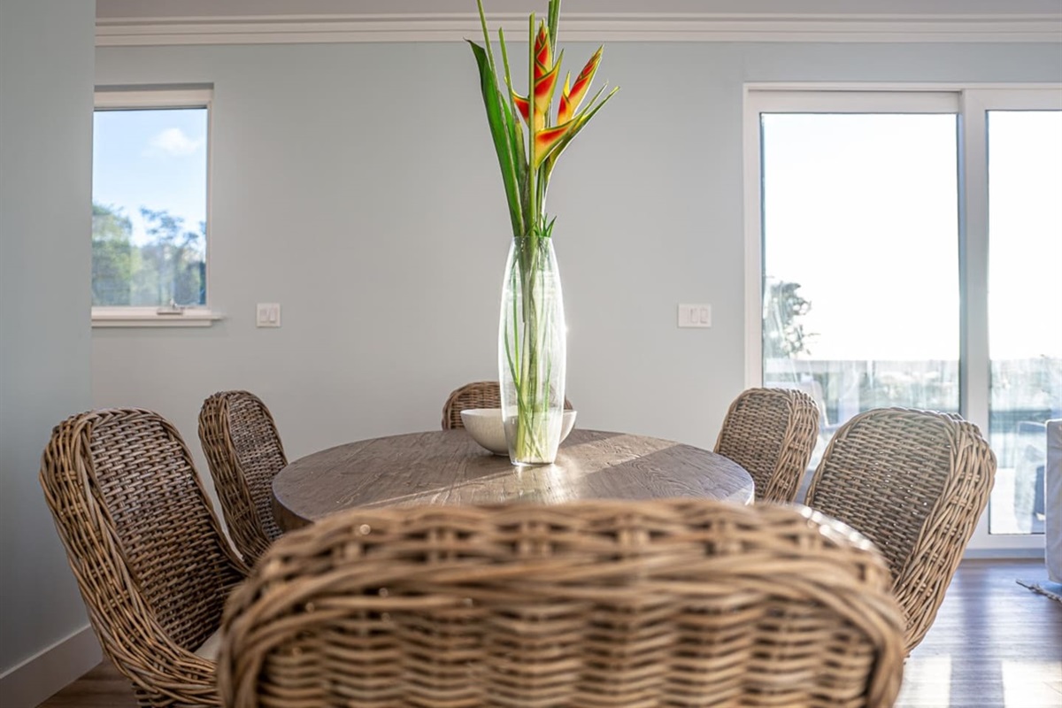 Dining for six with views of the outdoors.