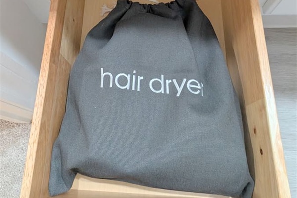 Hair dryers are located in every full bathroom. 