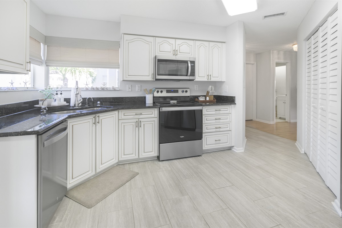 Fully equipped with modern appliances, the kitchen makes meal prep a breeze&mdash;whether you're brewing morning coffee or cooking up local seafood