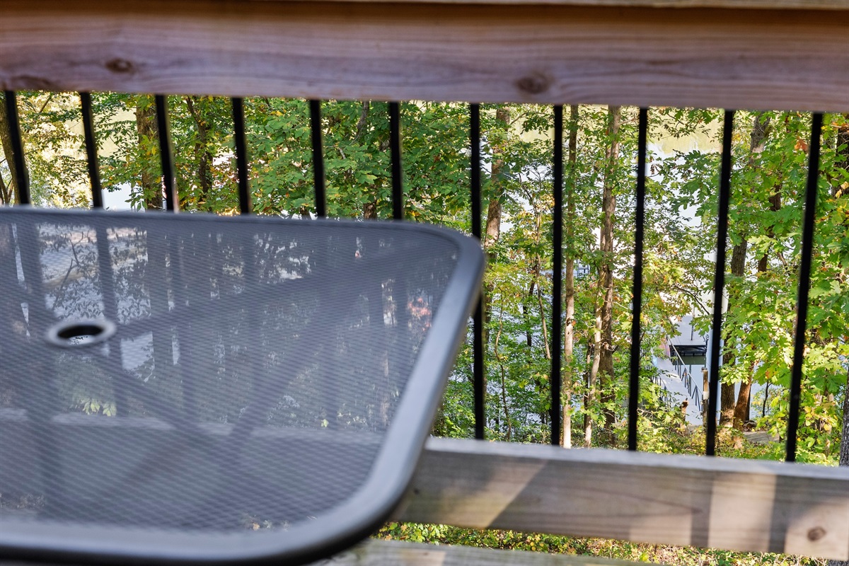 Sit at the bistro set overlooking the lake