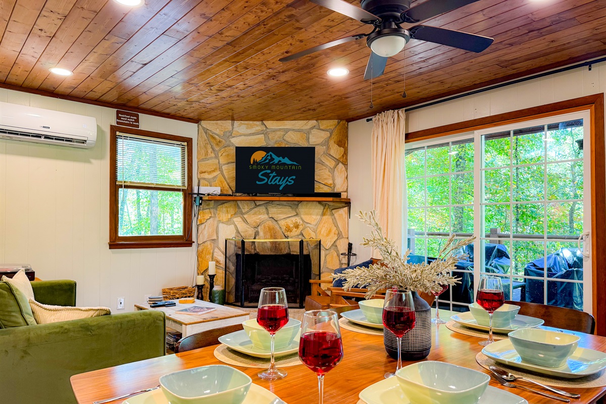 Our main level living room and dining area! Enjoy the peacefulness and treehouse feel from the inside!