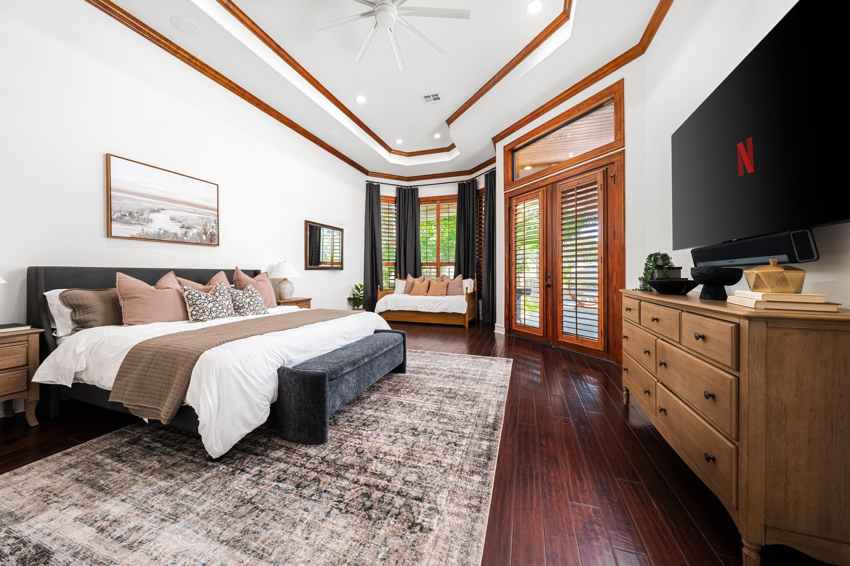 Stretch out and relax in spacious, elevated comfort. Our primary bedroom has a king-size bed and a twin-size trundle bed.