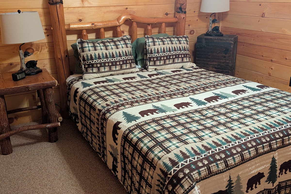Lower level bedroom with queen bed