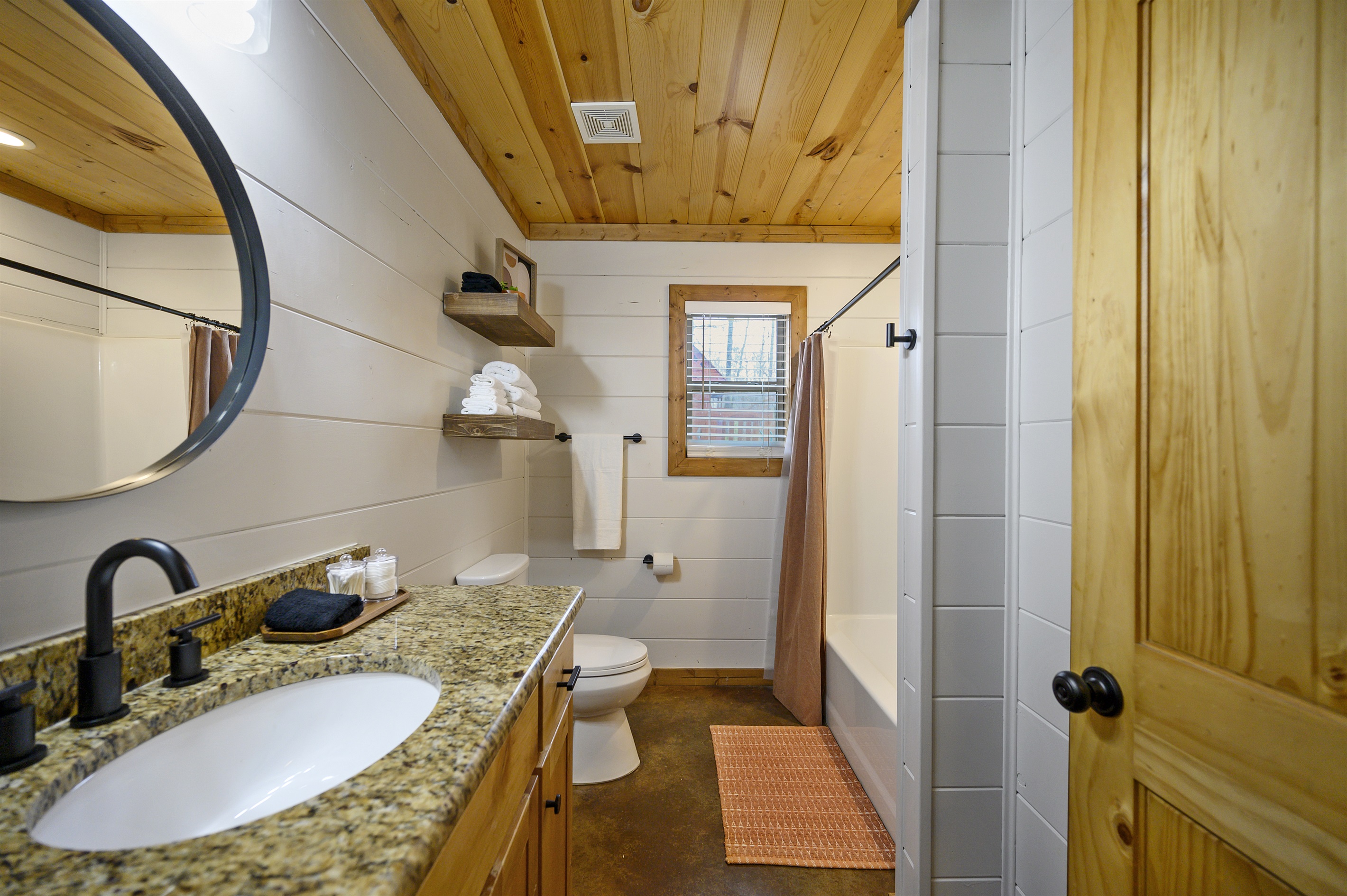 Indulge in luxury and relaxation in our spacious full bathroom oasis