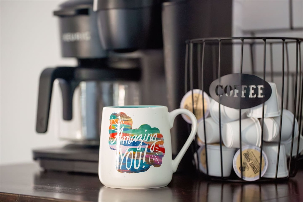 Coffee bar with fun mugs and a selection of K cups or ground coffee!