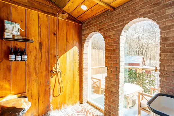 Unique open primary bath design - open concept, rain shower head, and private balcony!