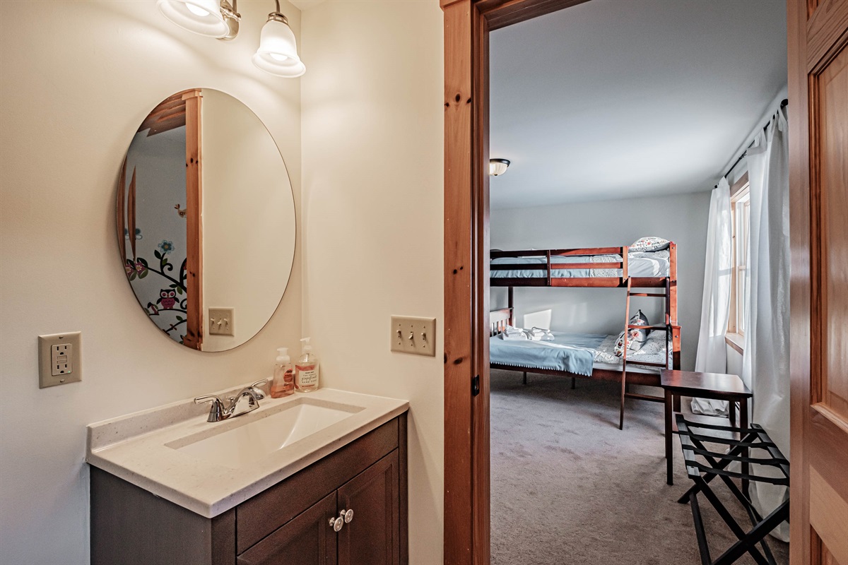 Convenience and comfort in a full bath with shower steps from the bunk room.”  Do you want me to also make a shorter version (like “Full bath with shower off the