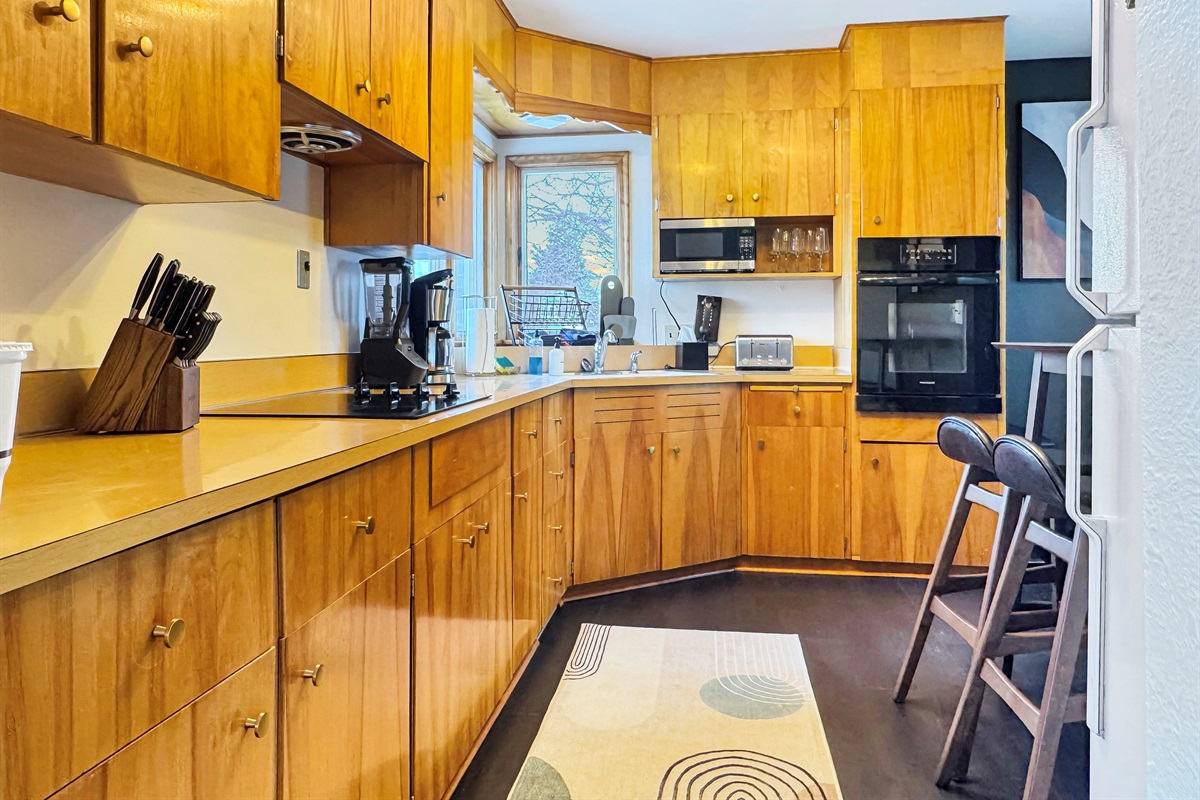 Fully equipped kitchen with modern appliances and everything you need for home-cooked meals