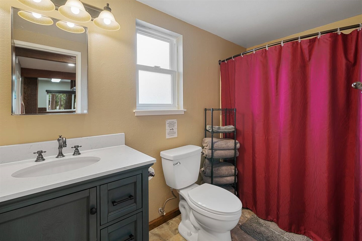 Downstairs full bathroom with tub/shower combo