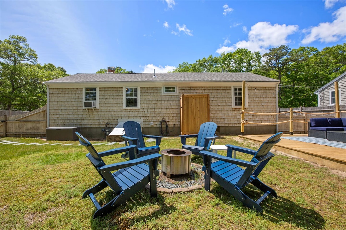 Fully fenced and full of charm: lounge on the deck, fire up the grill, or unwind by the fire pit.