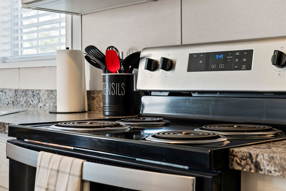Close-up of the stove and cooking area—ideal for preparing home-cooked meals with ease.