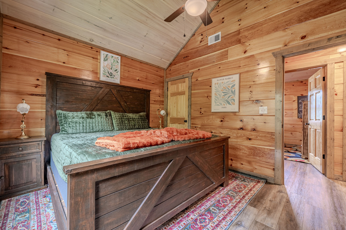 The Botanist Suite includes a Smart TV, storage, and cozy cabin details for a comfortable stay.