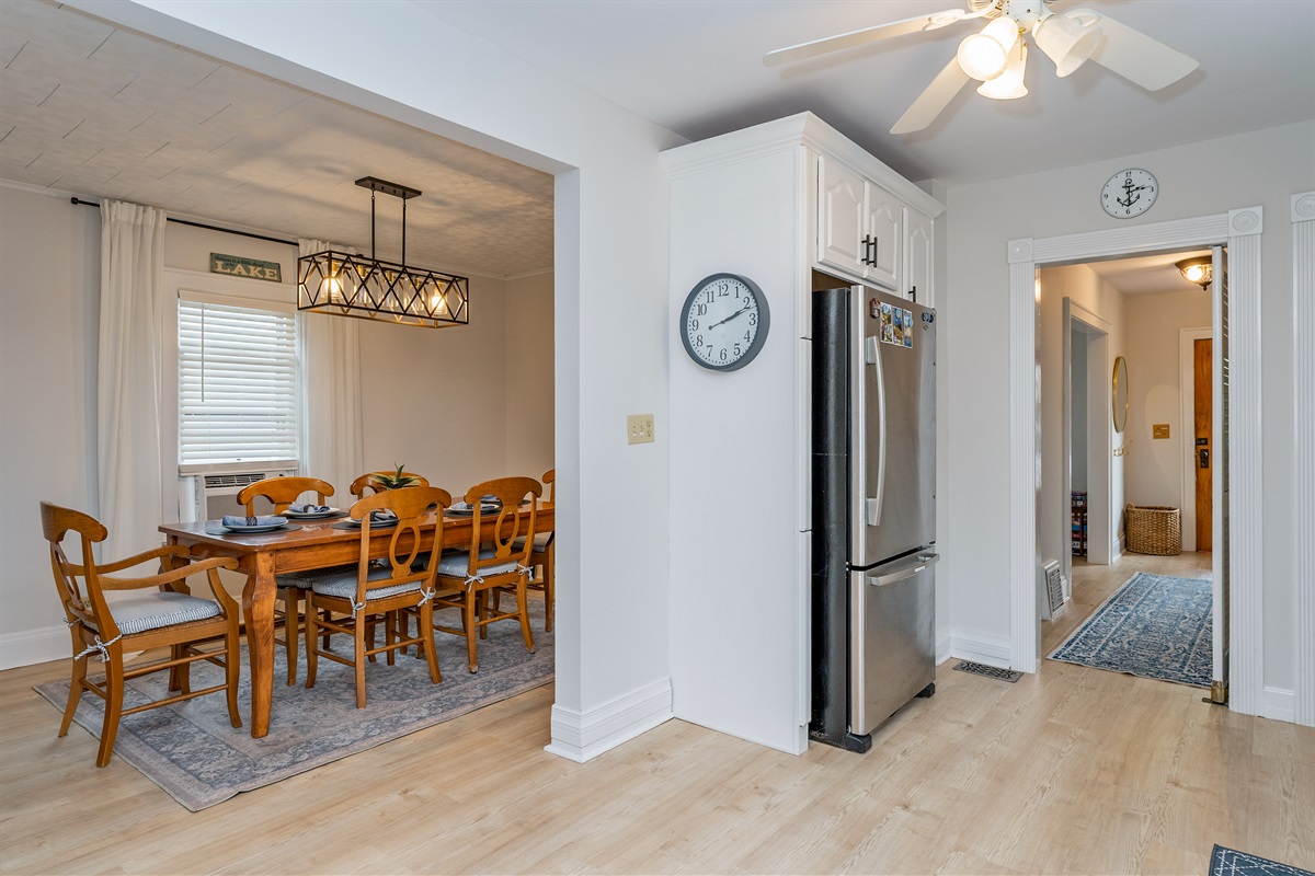 Open-concept dining area seamlessly connects to the kitchen, ideal for both intimate dinners and lively group gatherings.