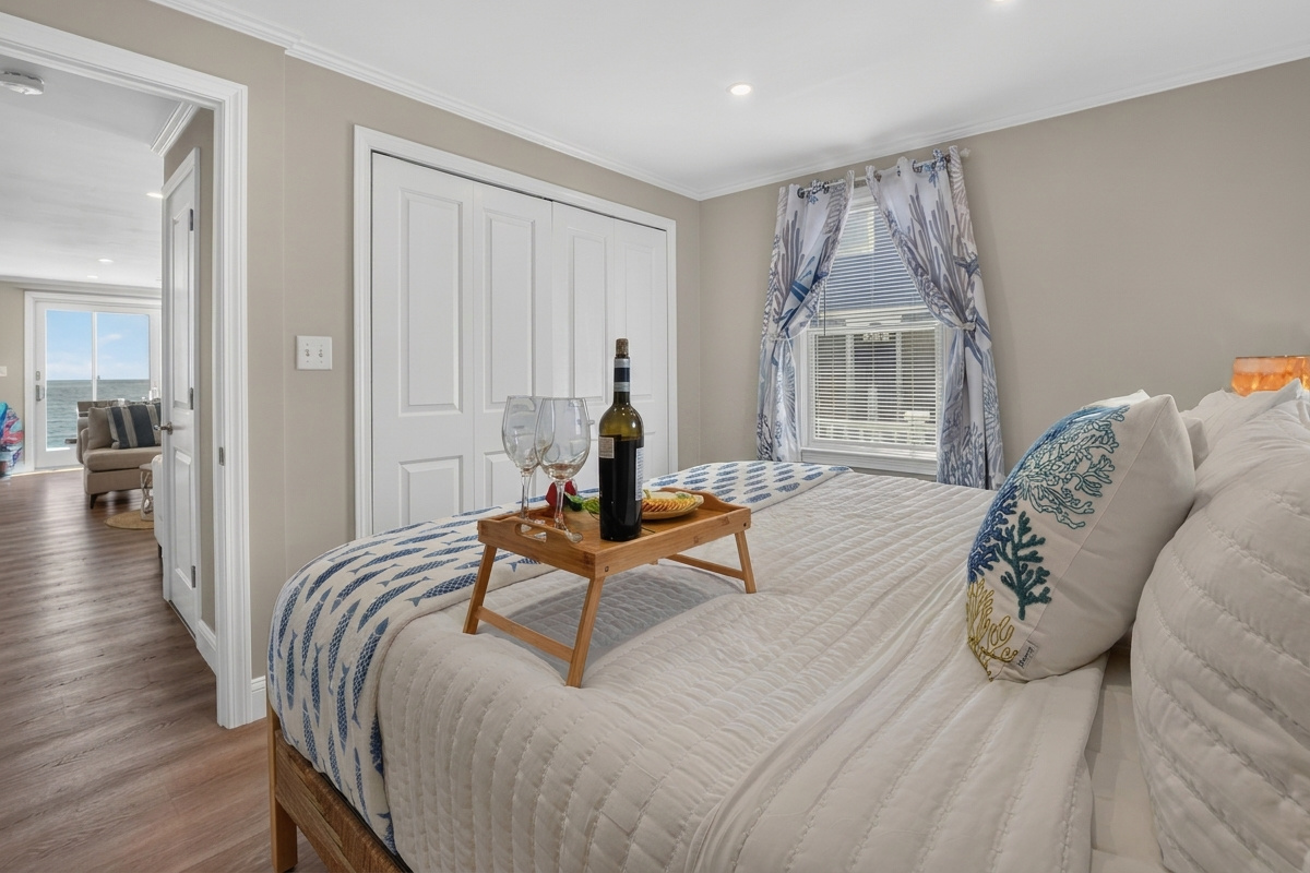 A cozy, inviting bedroom designed for restful nights after a day by the ocean.