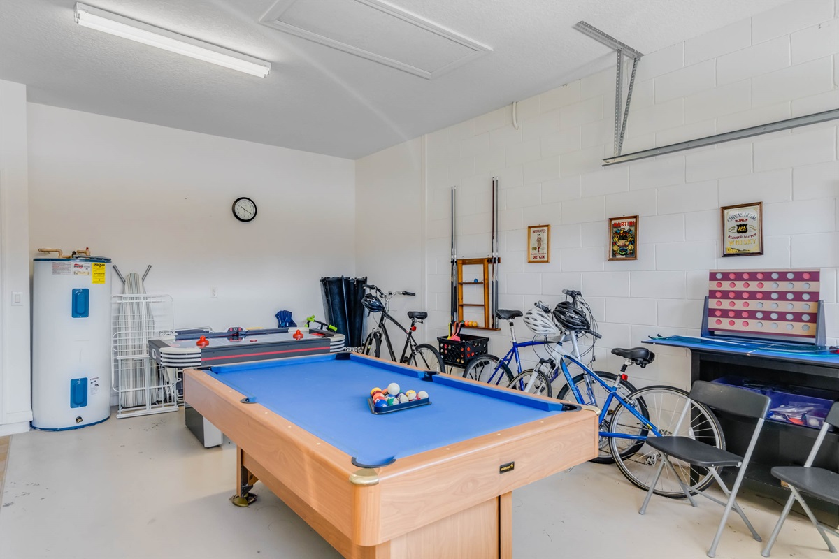 Three adult bikes and two kids scooters also in the game room!