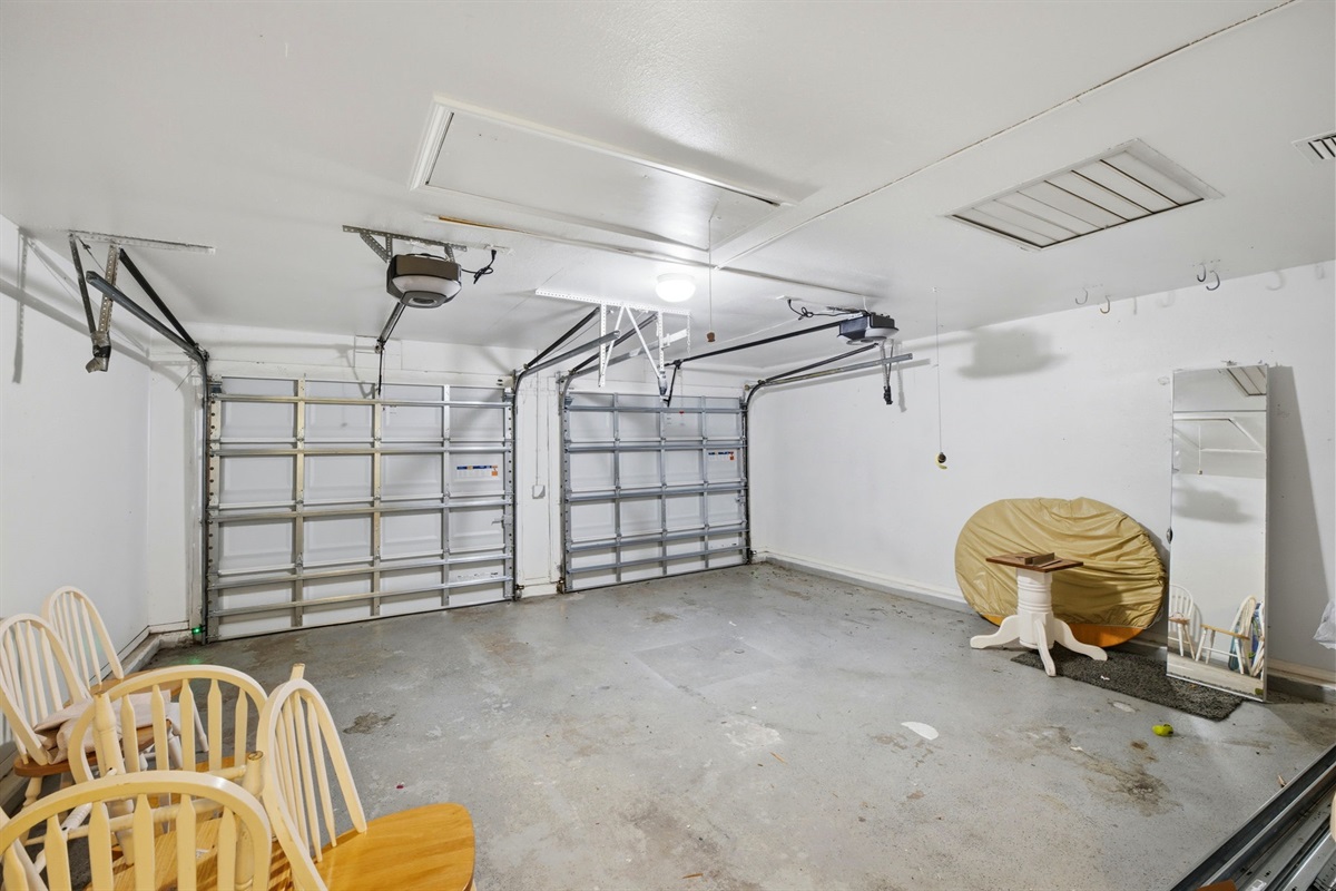 The spacious two-car garage offers plenty of room for parking, storage, or keeping bikes and beach gear organized during your stay. With easy access and ample space, it’s a convenient addition for guests who want extra room for vehicles and equipment.