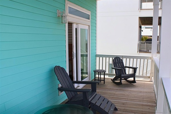 Second Story Deck: Unwind in stylish rocking chairs while soaking in ocean views!