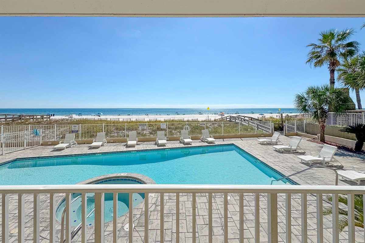 Where the pool meets the ocean.  Enjoy a seamless blend of relaxation and recreation in this idyllic beachfront setting.