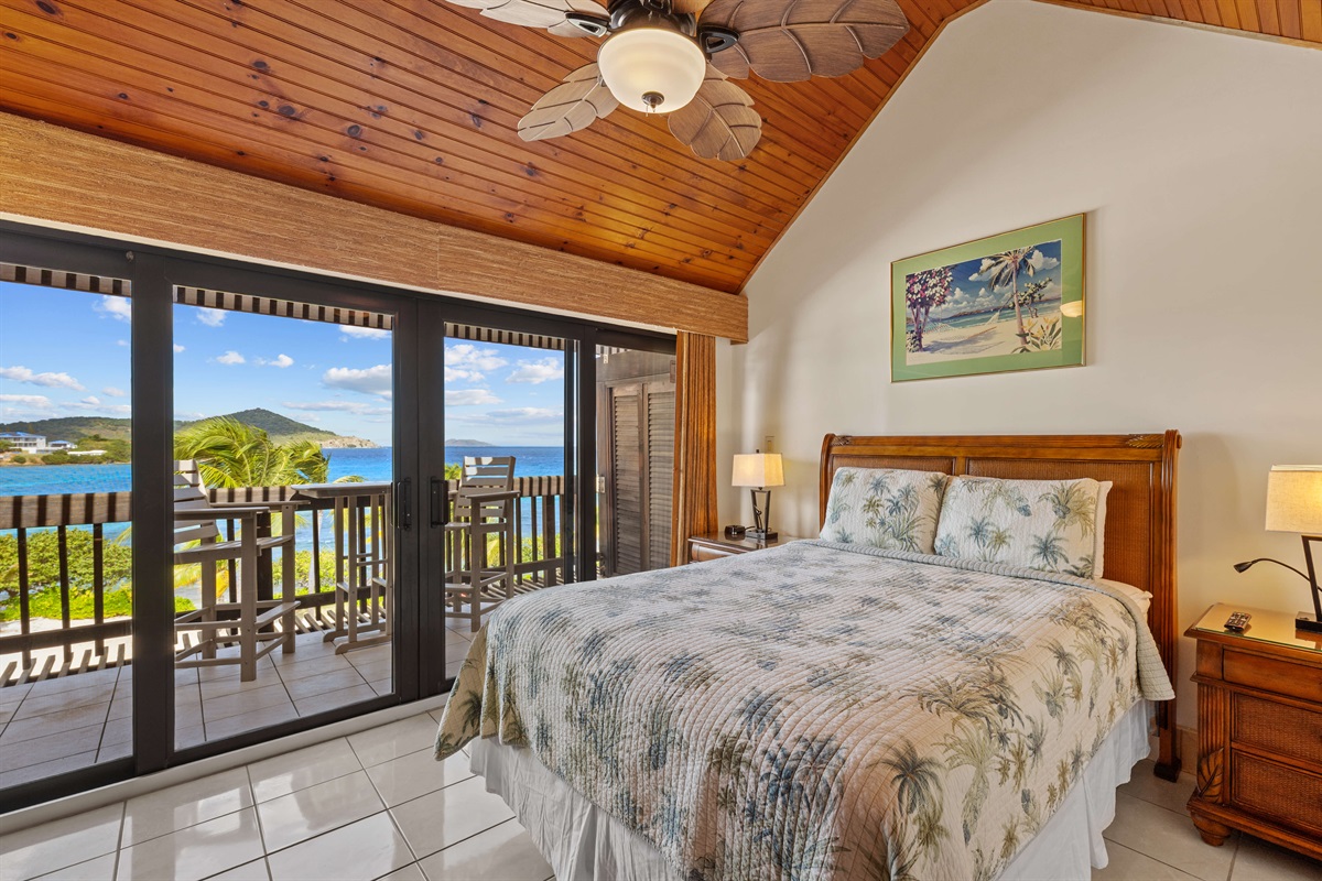 Primary bedroom with private balcony