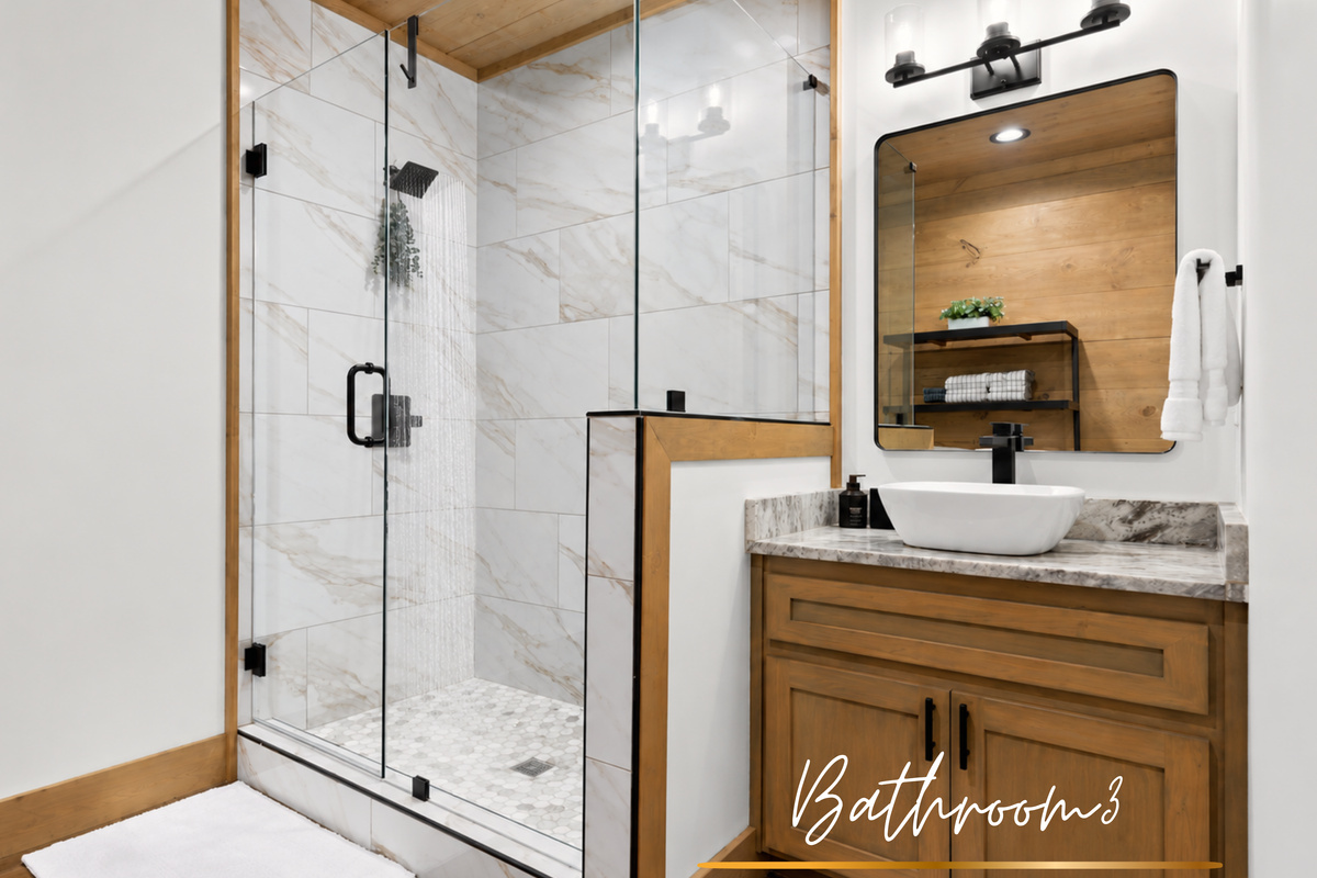 A private bathroom with a sleek vanity and a warm shower. Everything you need to refresh and relax.