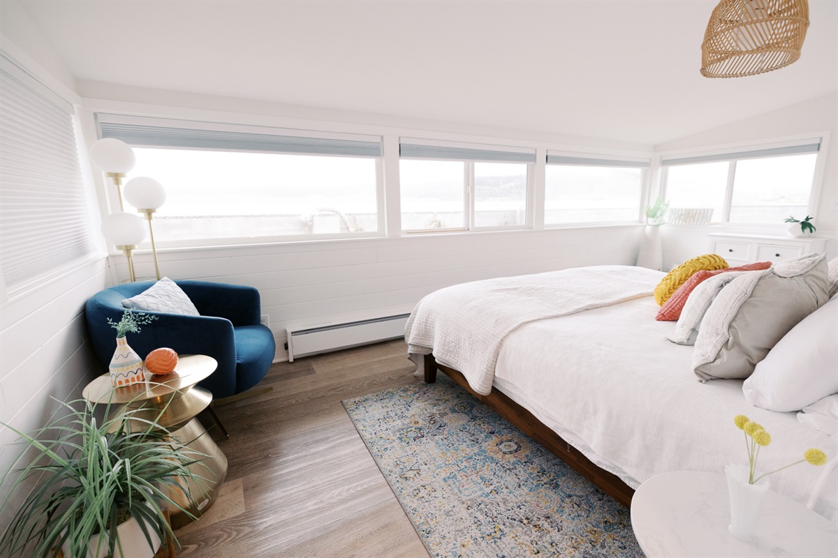 Guest Room 2 junior master "Sunrise Room" with king and private bath facing Swan Lake.