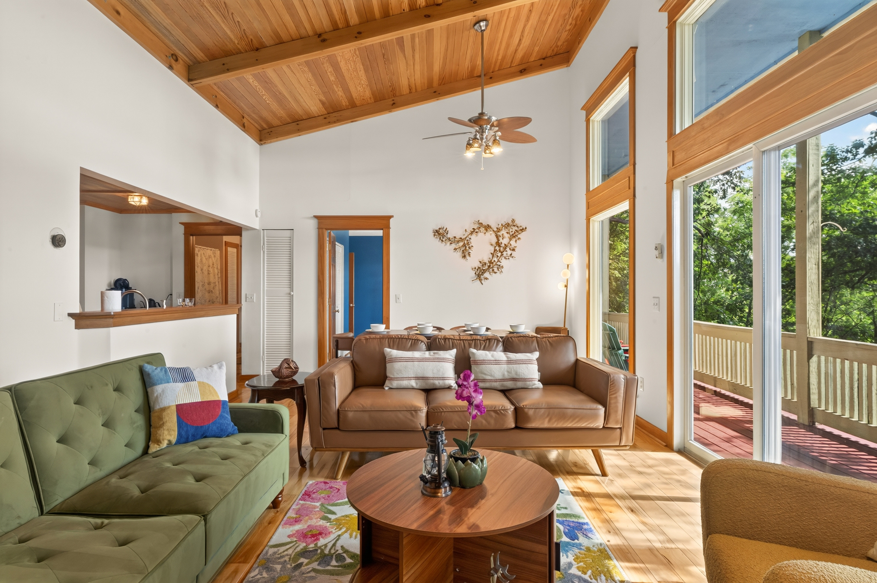 Living area with vaulted wood ceiling