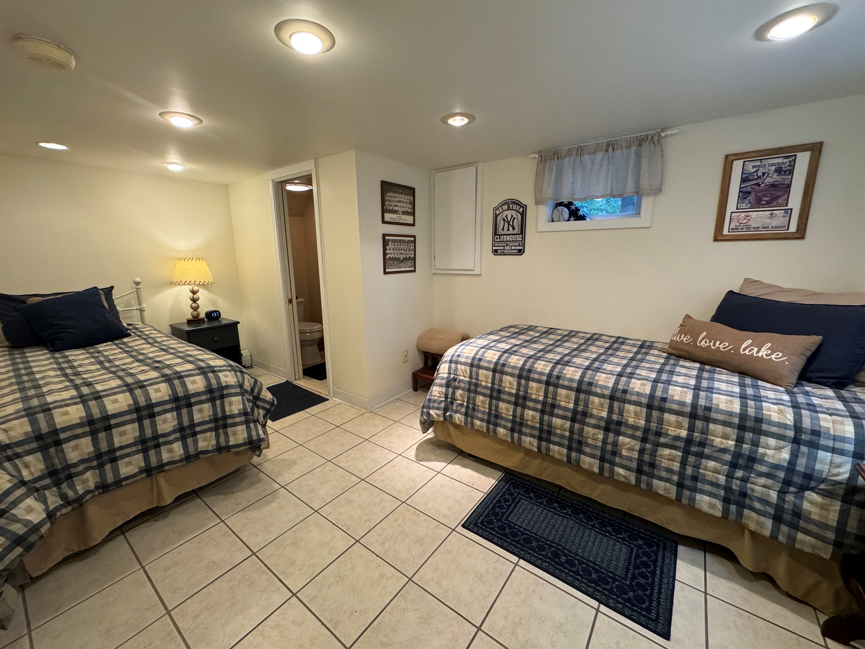 Lower level Twin bedroom with powder room.
