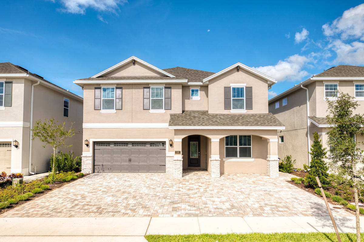 Stunning modern villa exterior with spacious private driveway parking