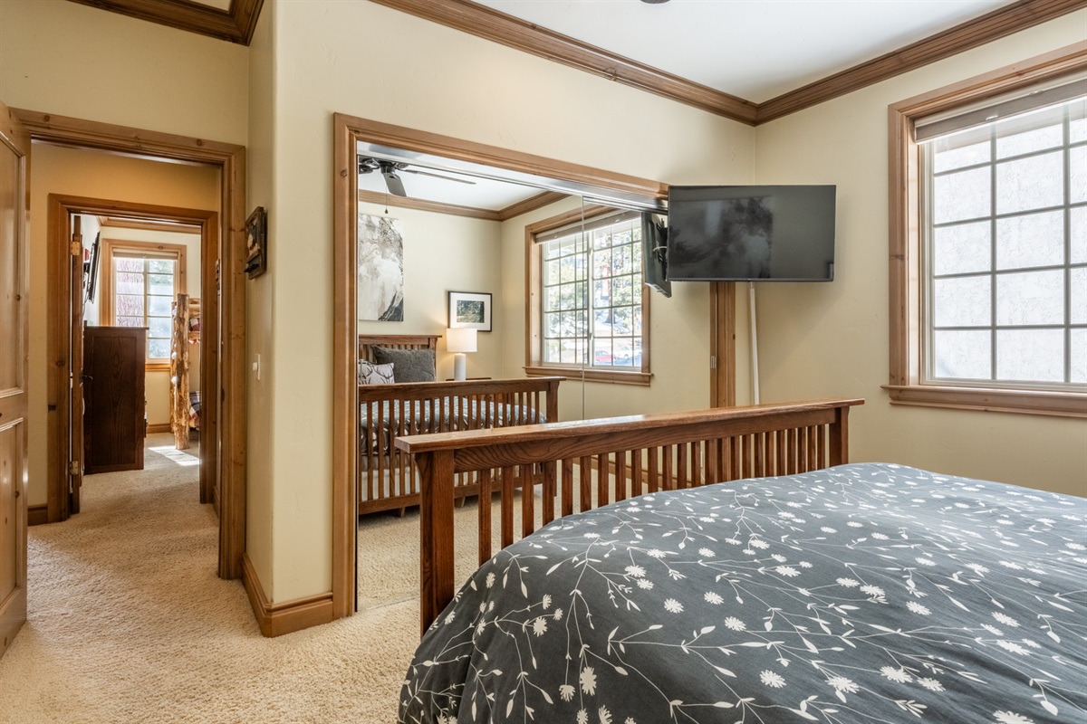 King bedroom with adjacent bathroom, offering privacy and comfort—an ideal setup for adults or couples.