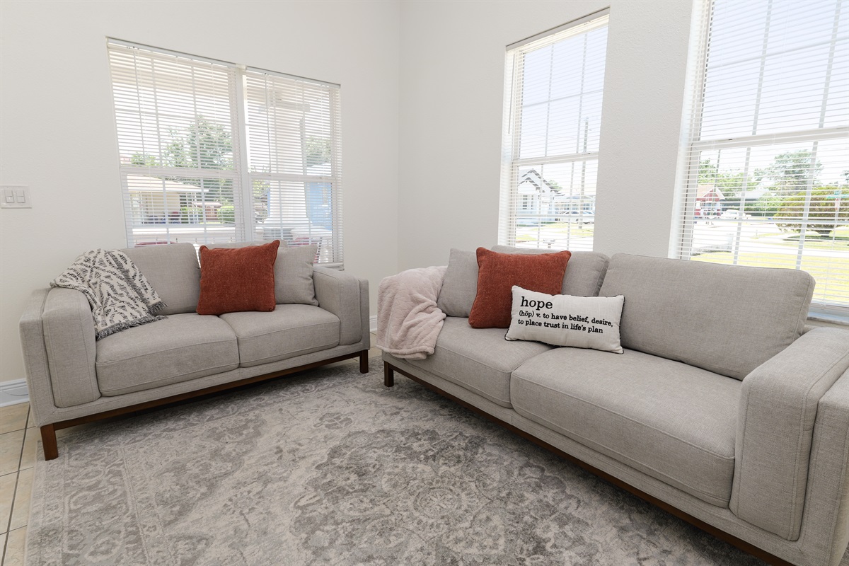 Stream your favorites or curl up with a book—this comfortable, stylish living area has everything you need to recharge.