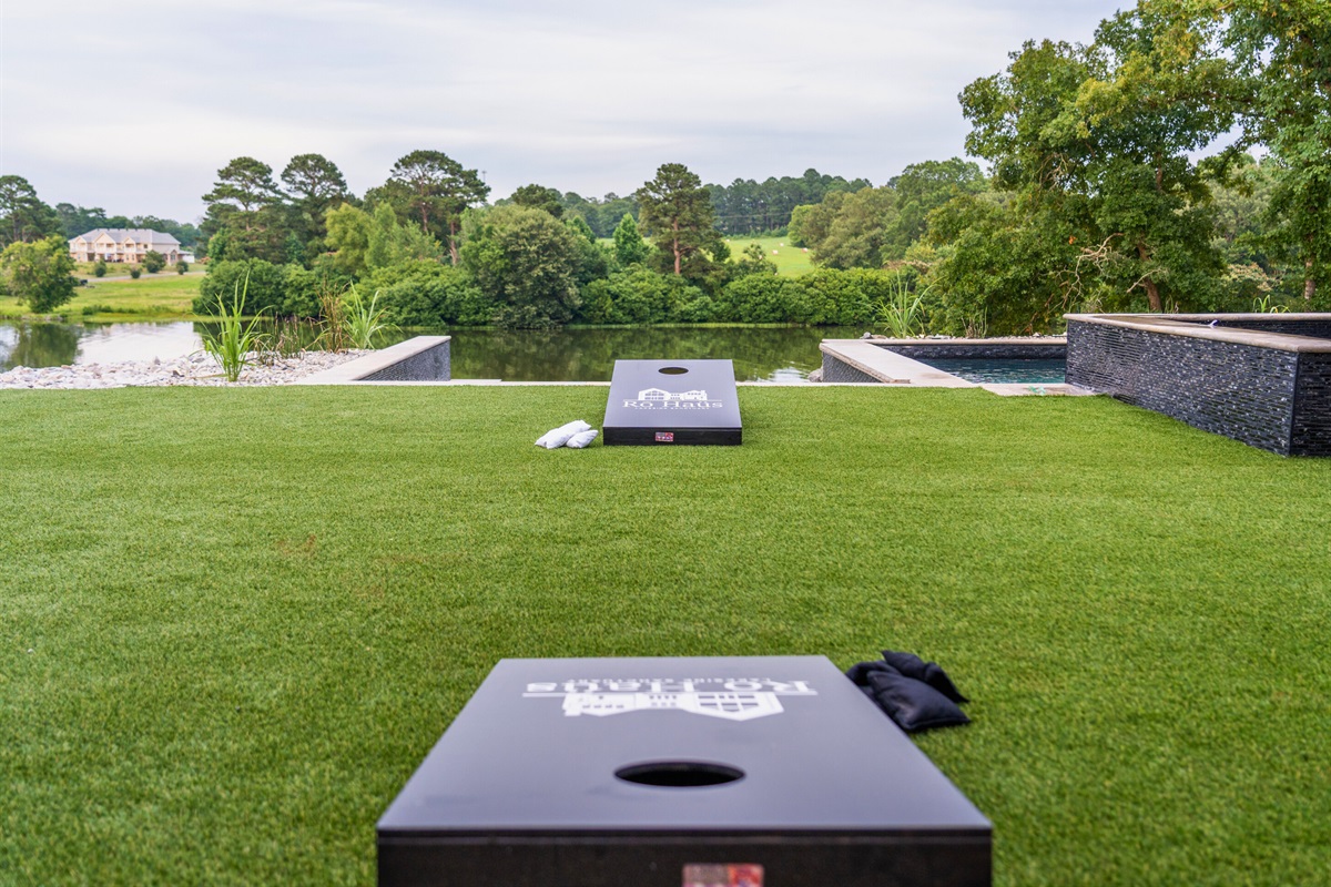 Challenge friends to a game of cornhole with scenic views in the background, making your outdoor activities even more enjoyable.