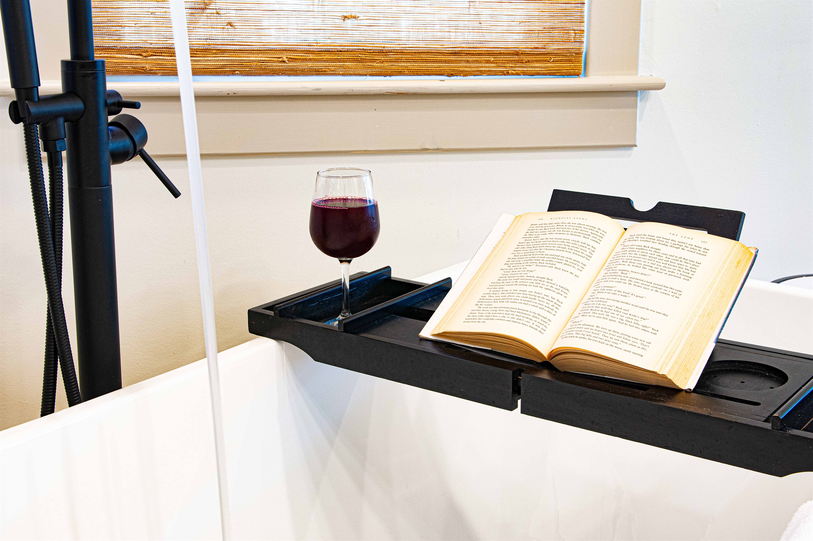 Read a book & drink a glass of wine as you relax in your private soaking tub