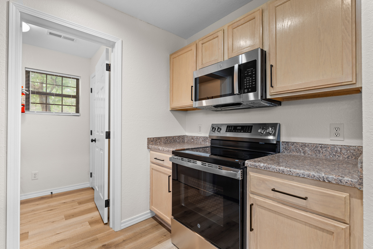 A full-size range, oven, and microwave make it practical to prepare more than snacks.