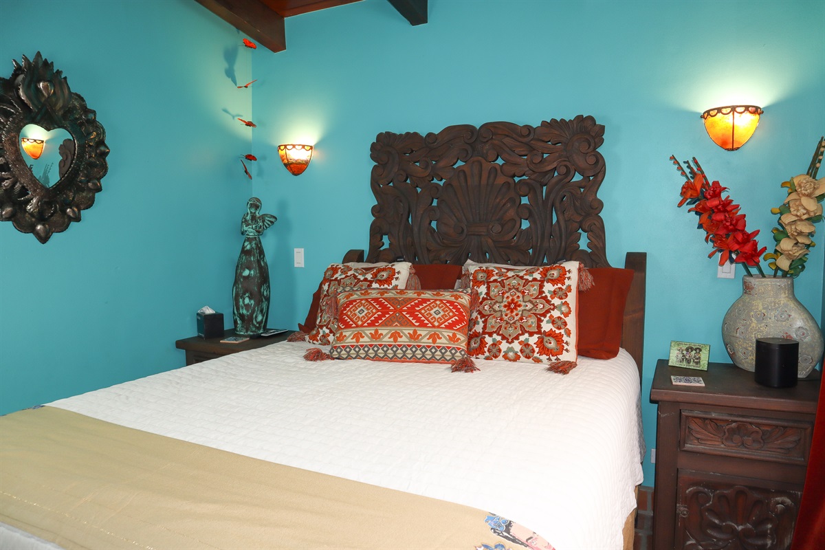 Upstairs Guest Bedroom with a full-size bed.