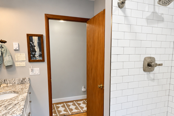 Updated bathroom with tiled shower.