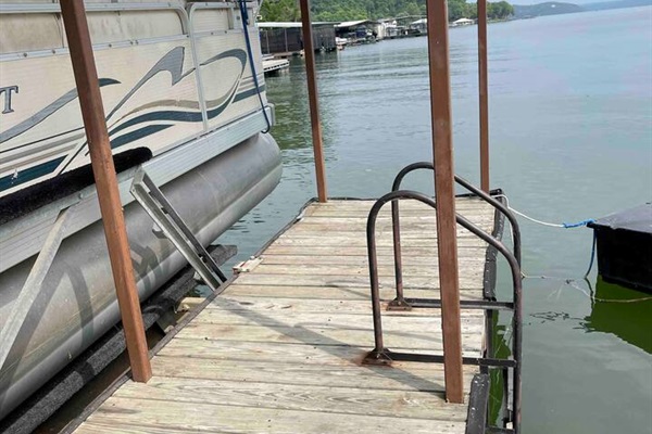 Community dock has a swim ladder 