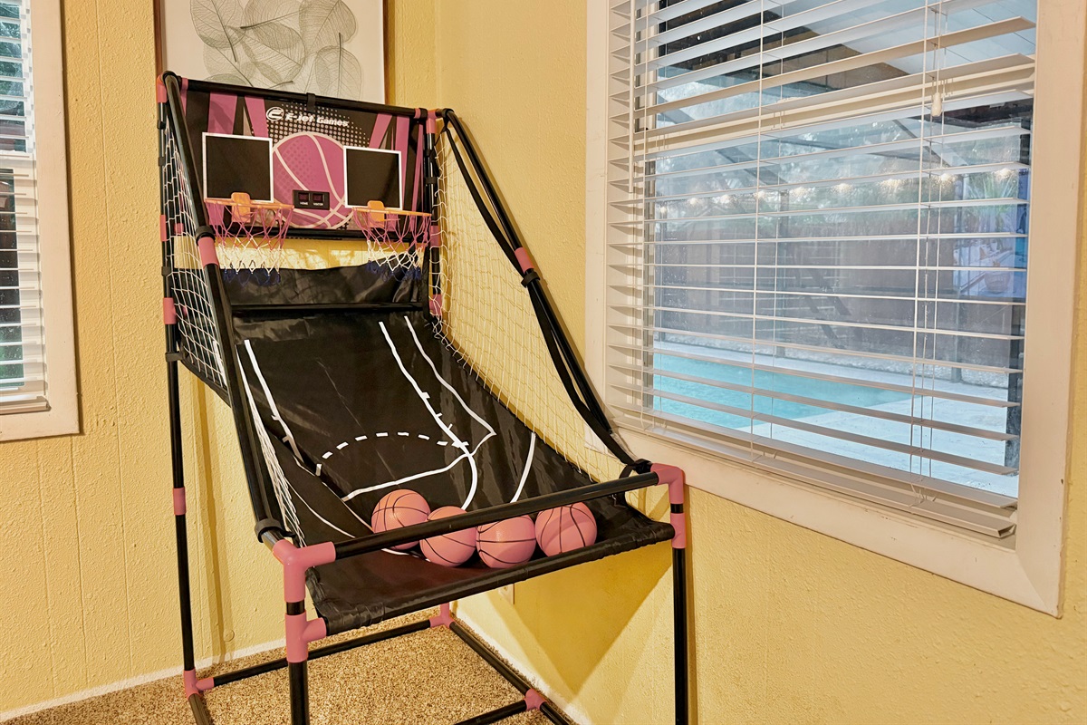 Enjoy endless fun with a basketball shootout game, cozy carpeted floors, and a smart TV setup—ideal for game nights or Saturday cartoons.
