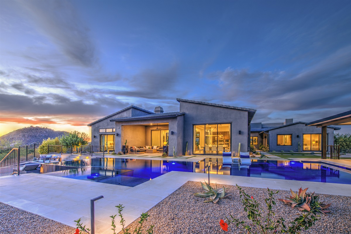 Serene retreat. Where the living room ends and the sunset begins. Experience true indoor-outdoor living by the water. 