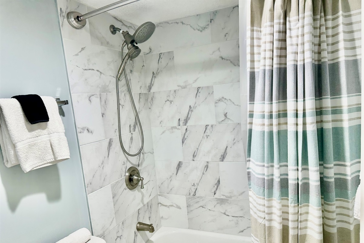 Updated tub, tile and shower head in the master bath!
