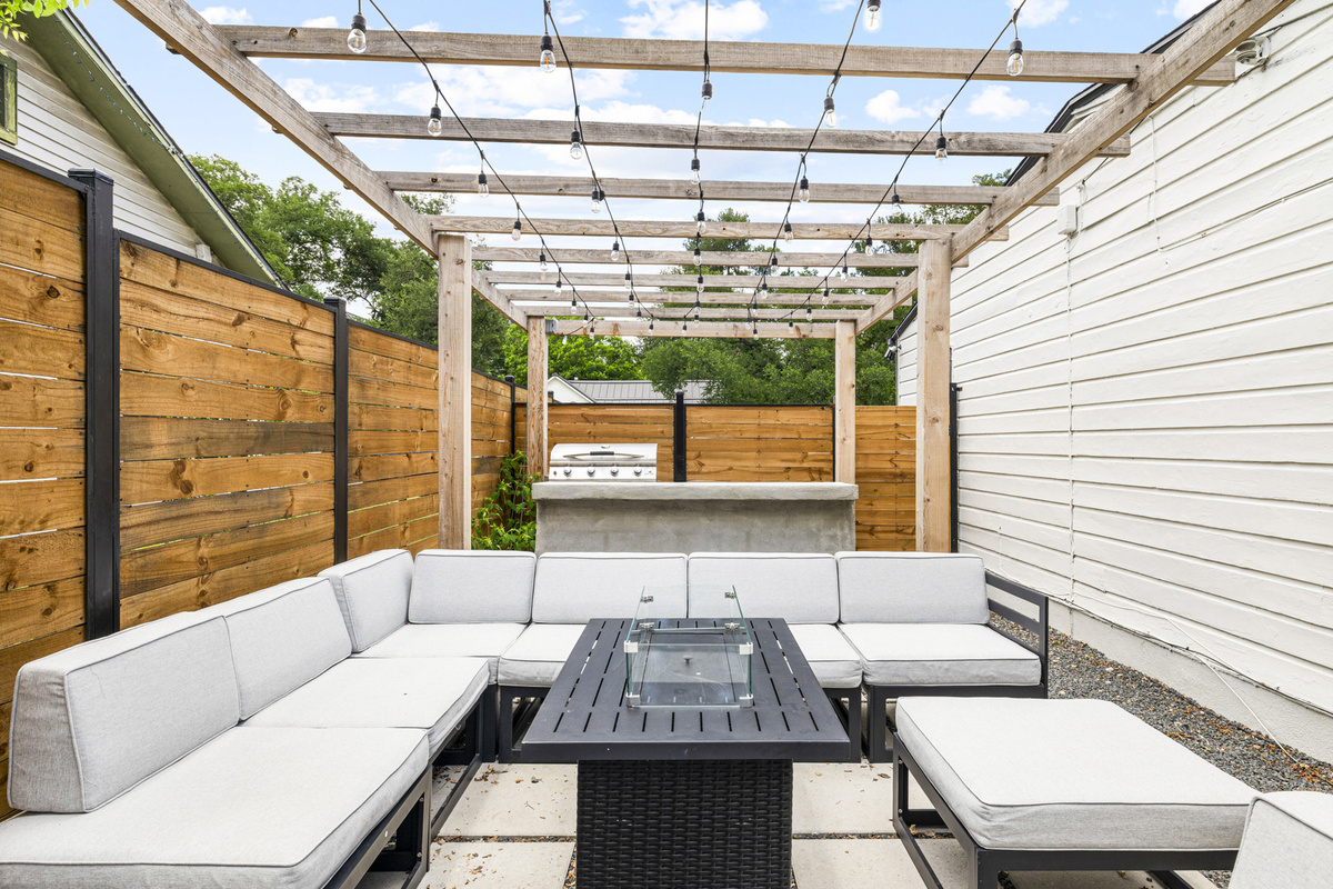 Stylish seating and ambient lighting create the perfect spot for evening gatherings!
