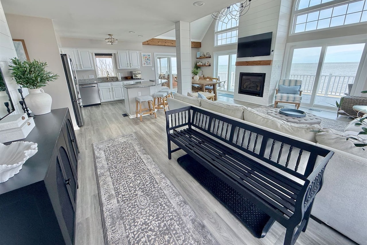 Enjoy luxury living in this spacious, open-concept floor plan. Featuring a gourmet kitchen, cozy seating area, and breathtaking ocean views through large windows, it is designed for effortless coastal elegance.