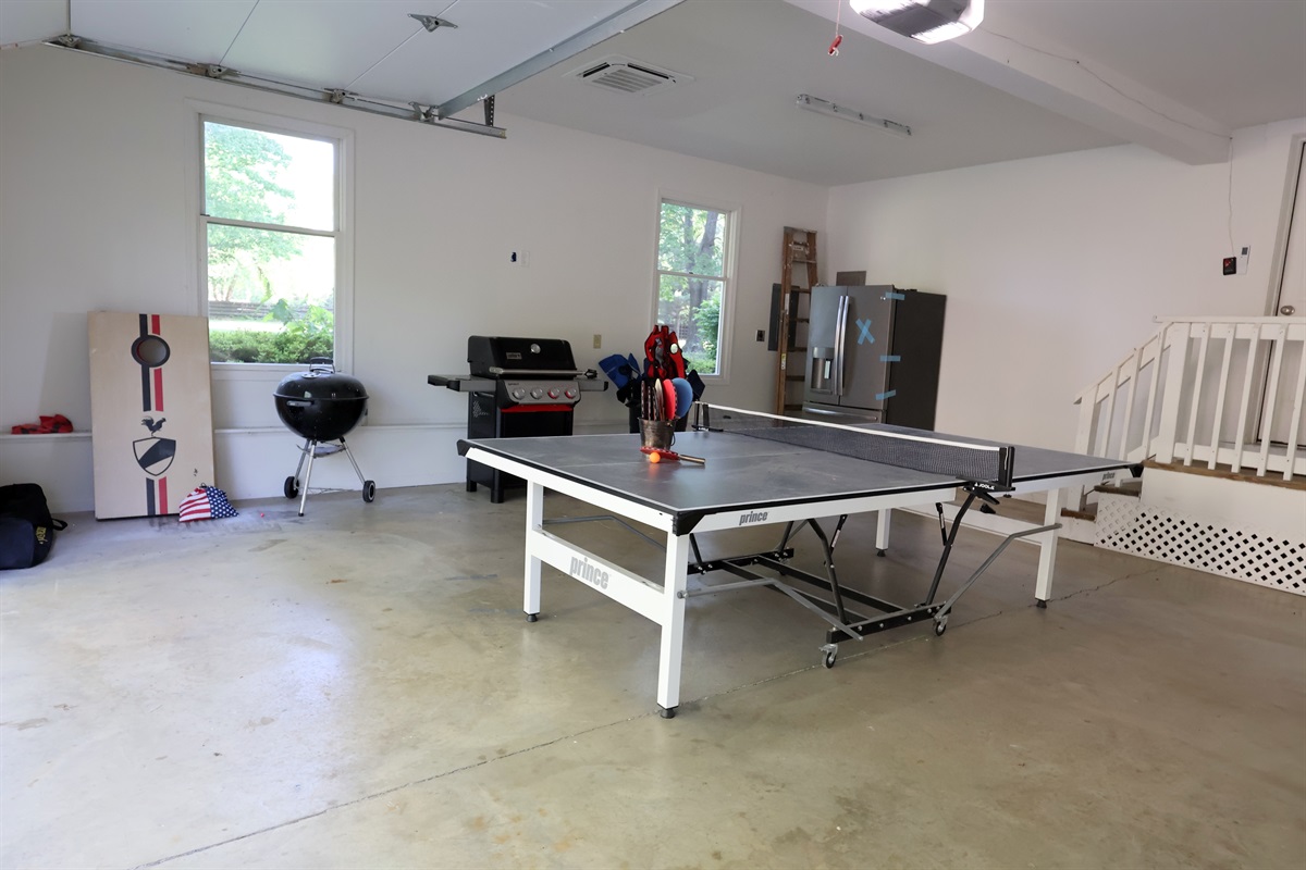 Play area in our garage: Ping Pong Table, Pickleball Bag, Corn Hole, Gas Weber Grill, Charcoal Grill (bring your own charcoal), camp chairs.